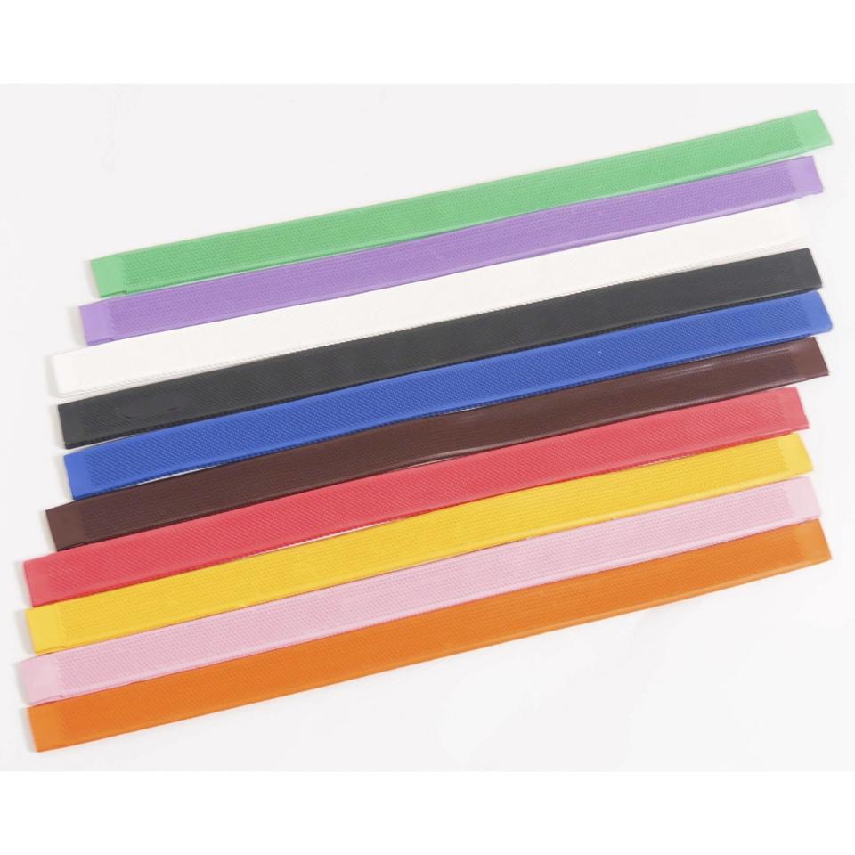 JMI non-slip rubber rein grips in red, designed for easy installation on horse tack, available in regular and long lengths.