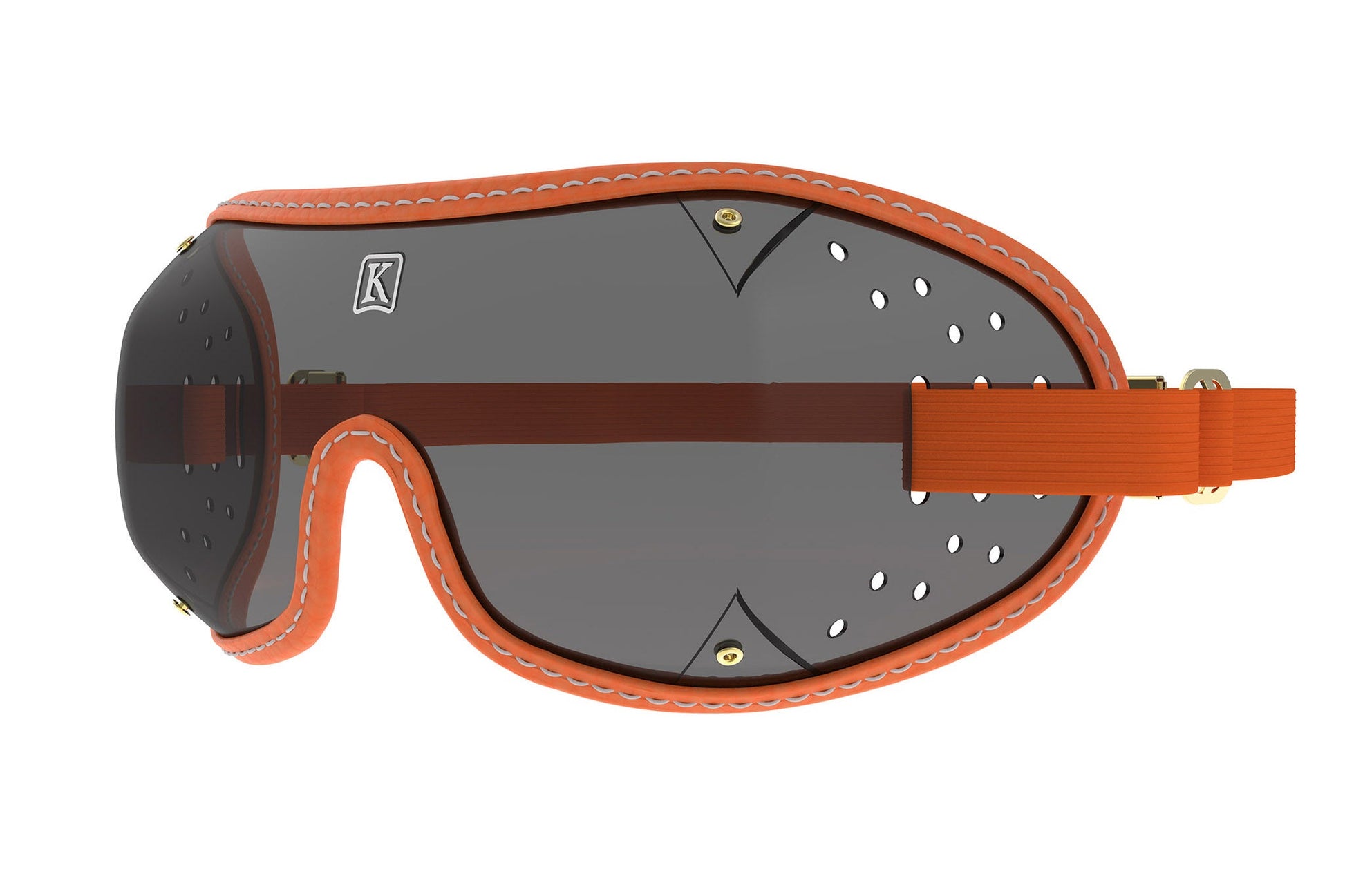 Black and orange vintage-style goggles with ventilation holes and adjustable strap.