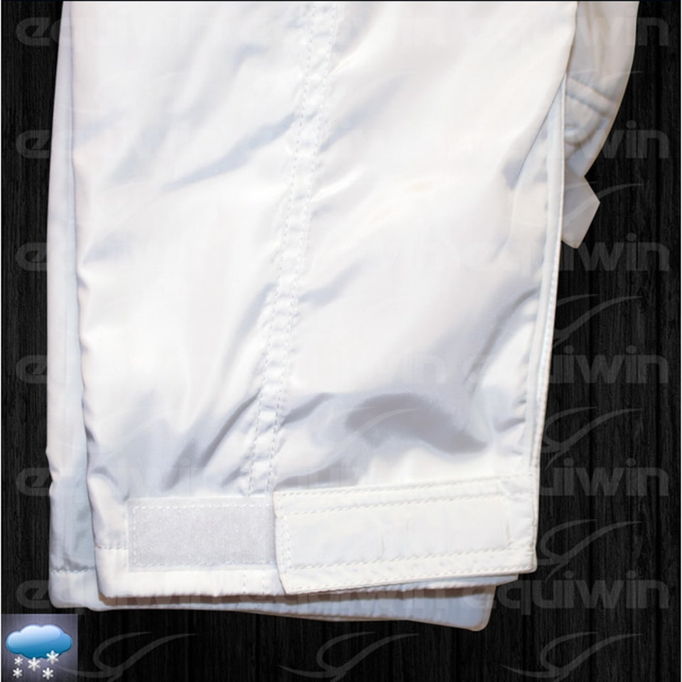 White thermal water-resistant winter riding pants by Equiwin, designed for cold-climate equestrian wear.