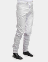 White waterproof over breeches for jockeys from OPR, featuring a sleek design and available in multiple sizes.