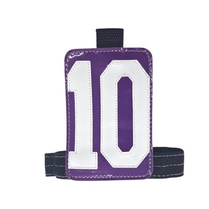 Purple luggage tag with white number 10 and adjustable strap.