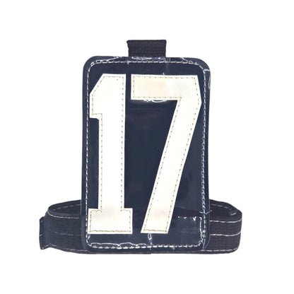 Navy blue ID holder with large white number "17" and adjustable strap