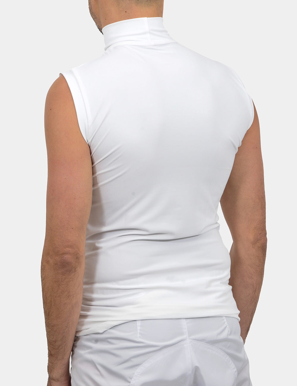 White sleeveless jockey shirt by OPR, featuring a classic fit and breathable fabric, ideal for equestrian events.